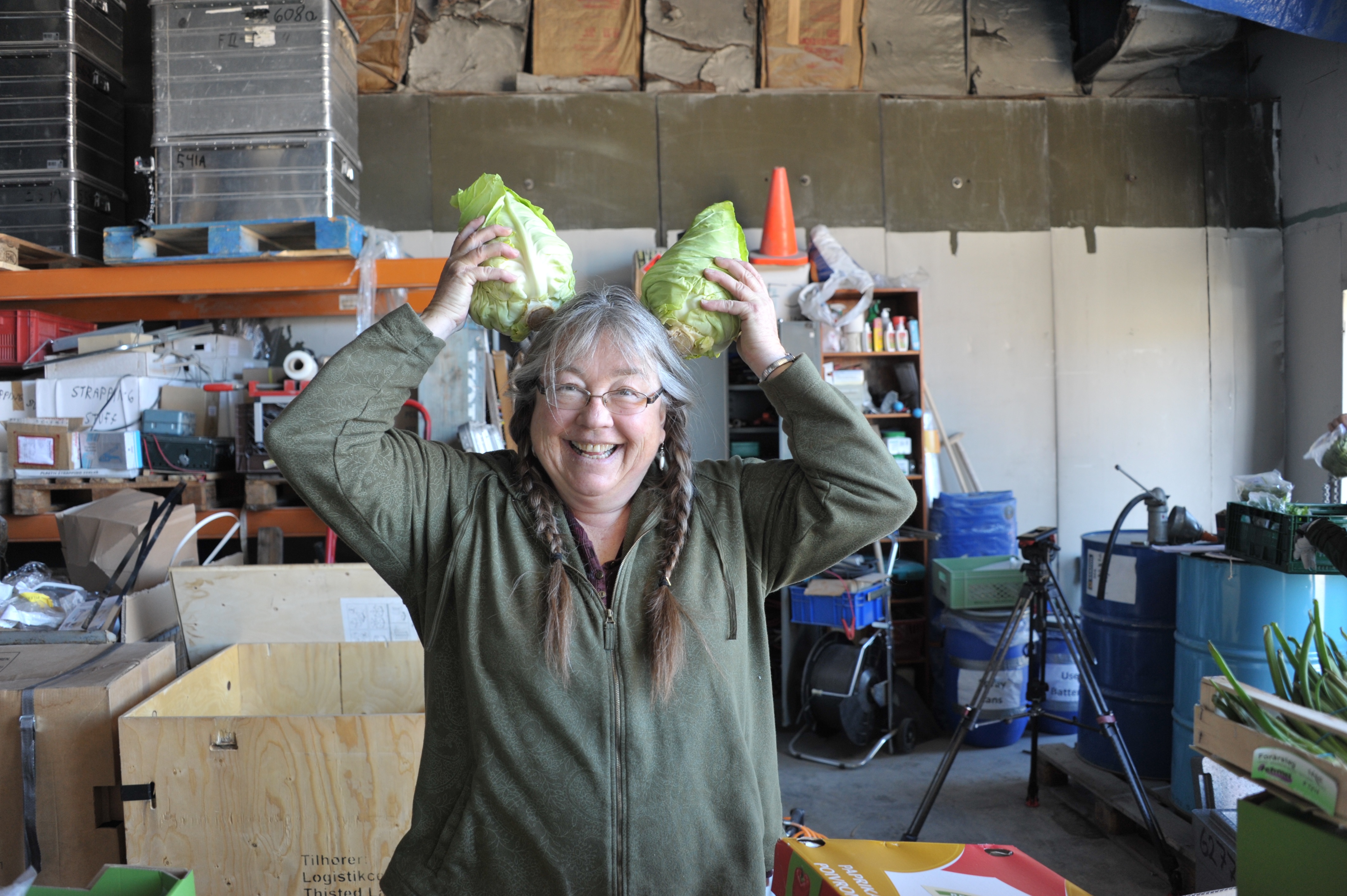Sarah the cook in the ware house in Kangerlussuaq packing food - and having a little fun
