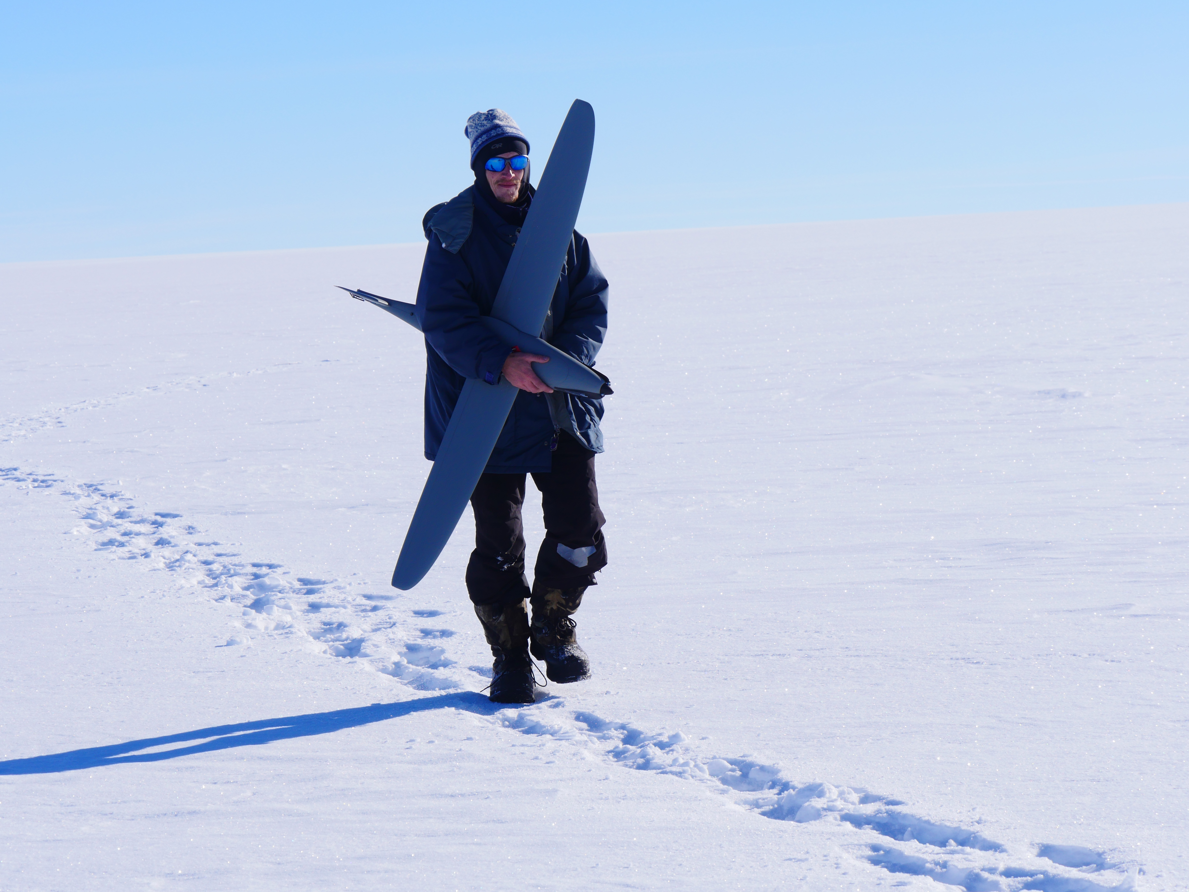 Aslak is walking the drone back after a successful measurement flight.